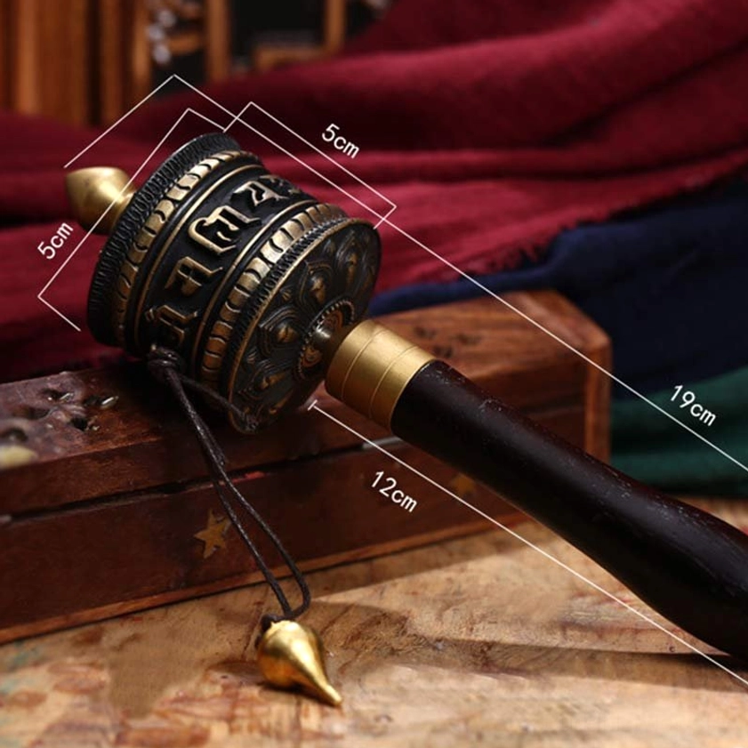 Buddhist prayer wheel with dimension measurements showing 5cm diameter wheel, 19cm total height, wooden grip detail