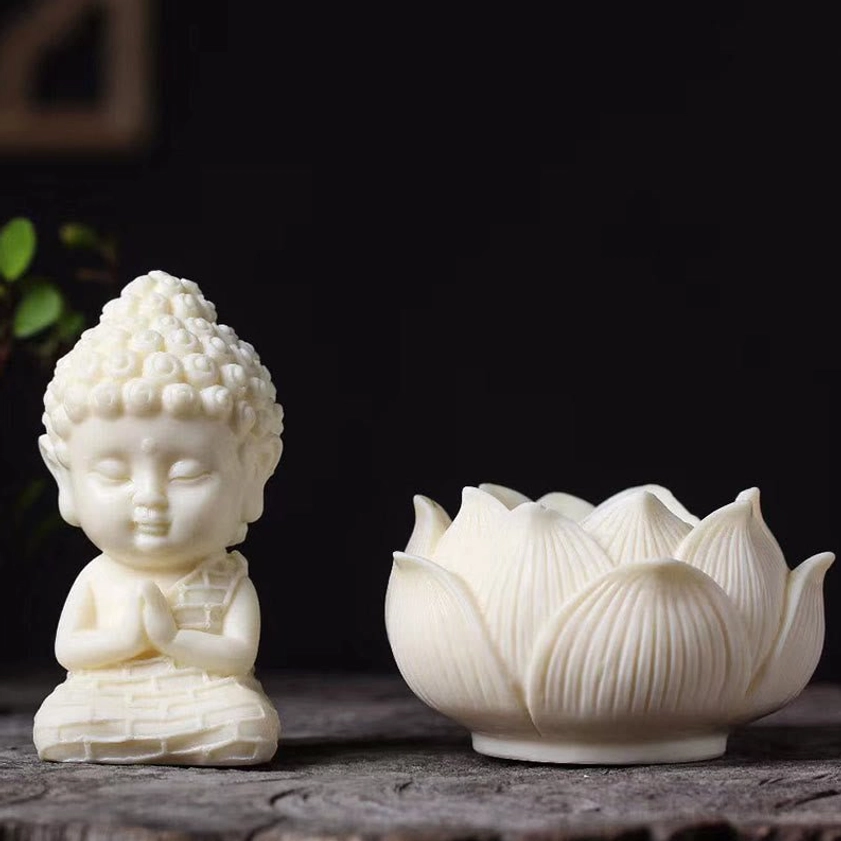 Praying baby Buddha with lotus meditation bowl - ivory fruit spiritual decoration flat lay