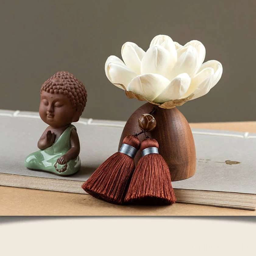 Praying Tathagata Buddha figurine with hands in prayer position on wooden lotus stand