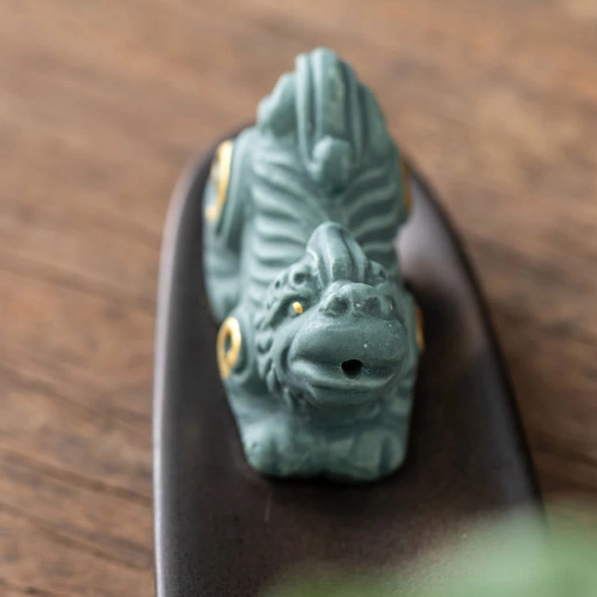 Premium ceramic Buddhist incense holder with symbolic figurine and vase decor
