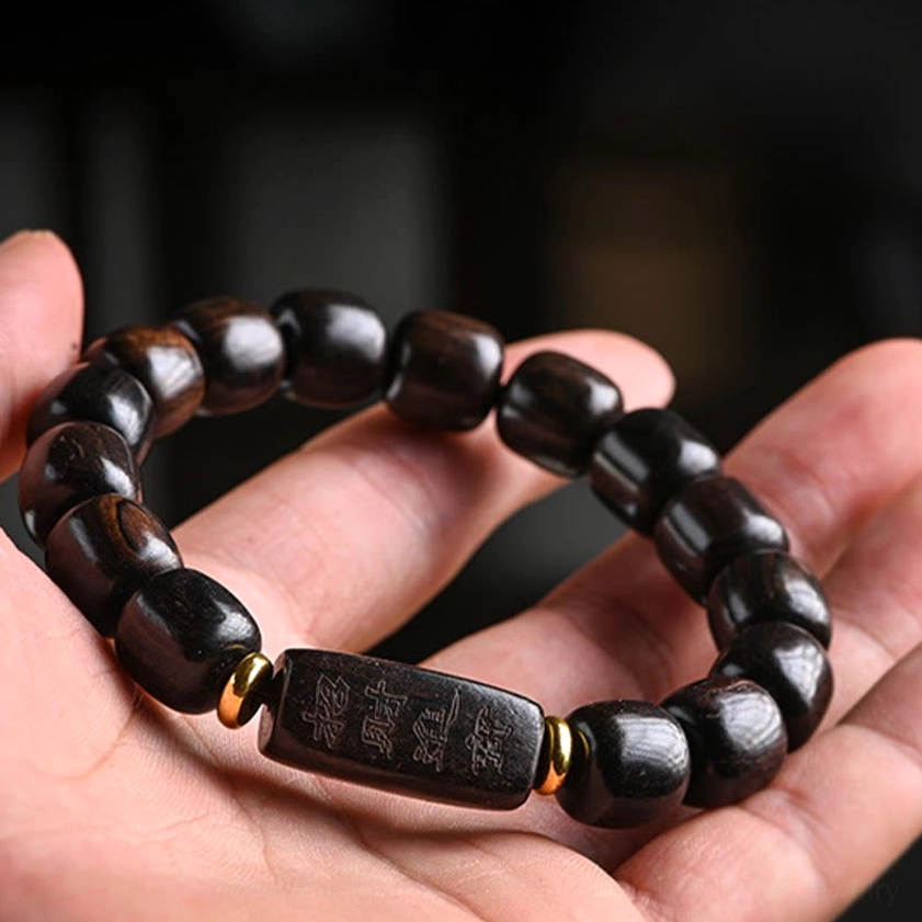 Premium elastic ebony wood barrel bead bracelet with adjustable fit for daily spiritual practice and meditation