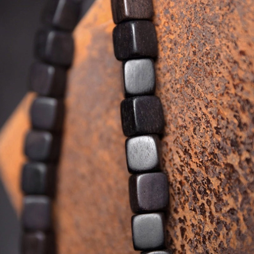 Premium elastic string ebony wood bracelet with hand-painted dzi bead and copper spacers