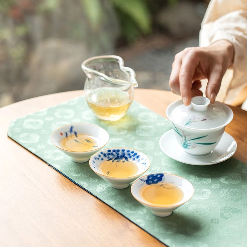 Premium hand-painted Buddhist ceramic teacup with traditional artisanal pottery techniques