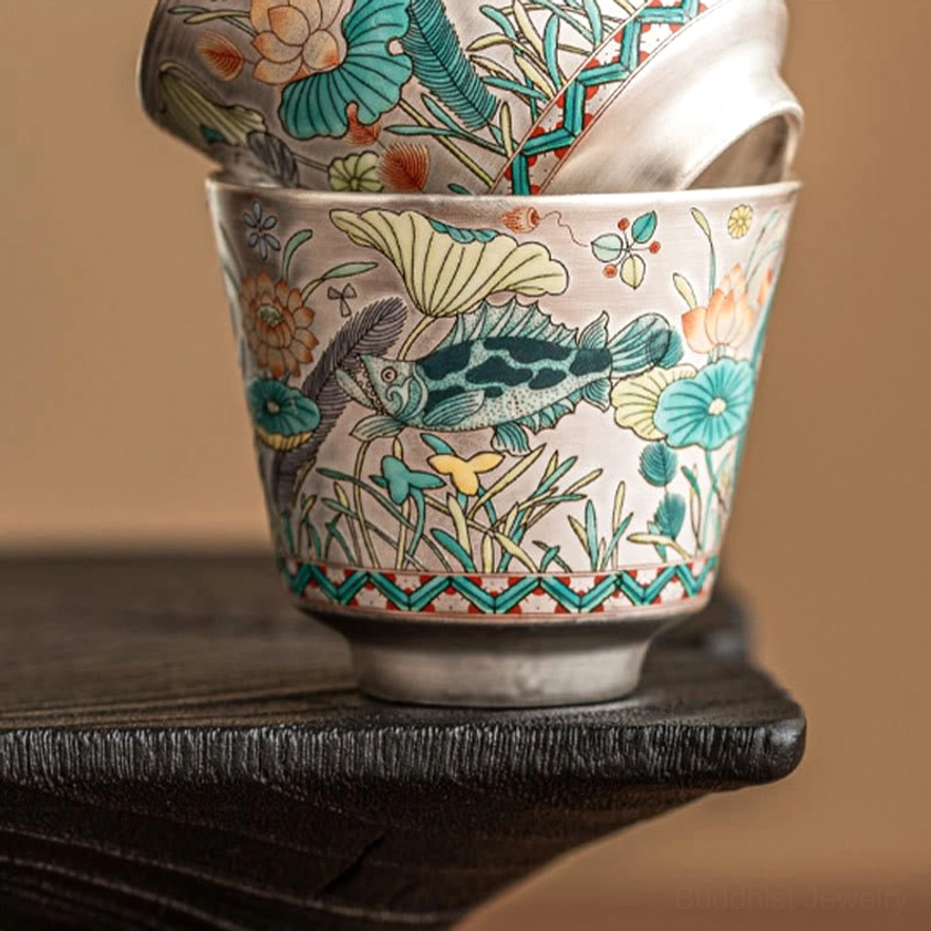 Premium handcrafted ceramic gongfu tea cup with lotus and fish motif, packaged gift set