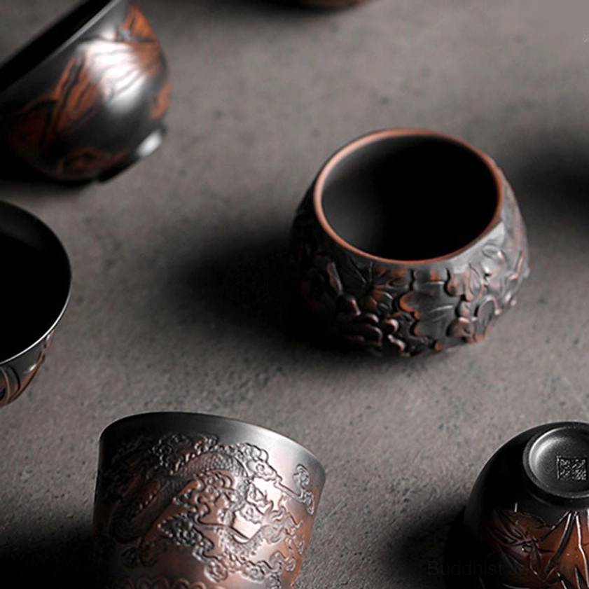 Premium handmade ceramic kung fu tea cup with high-fired glaze and artisanal craftsmanship details