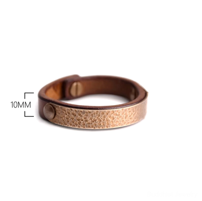 Premium handcrafted leather bangle with brass accents designed for prosperity and spiritual energy