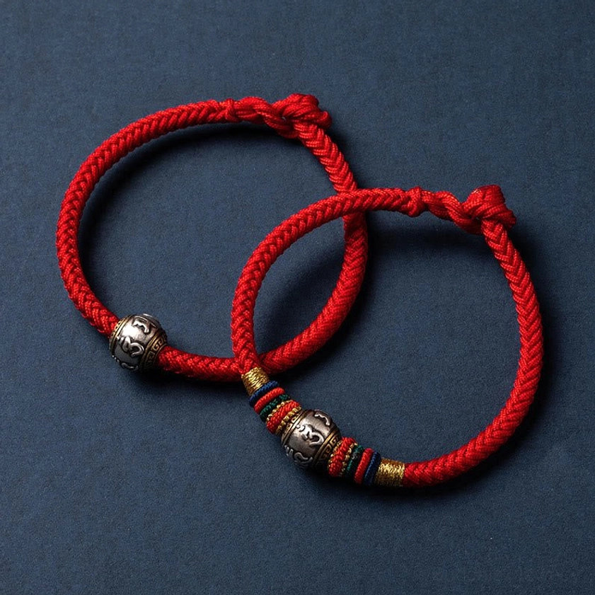 Premium 925 sterling silver Buddhist bracelet with sacred Om Mani Padme Hum inscription and traditional braided cord weave