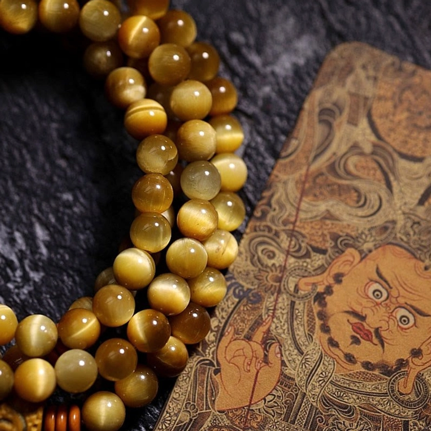Premium handcrafted Tiger Eye Mala Bracelet - natural gemstone beads with sacred Vajra charm