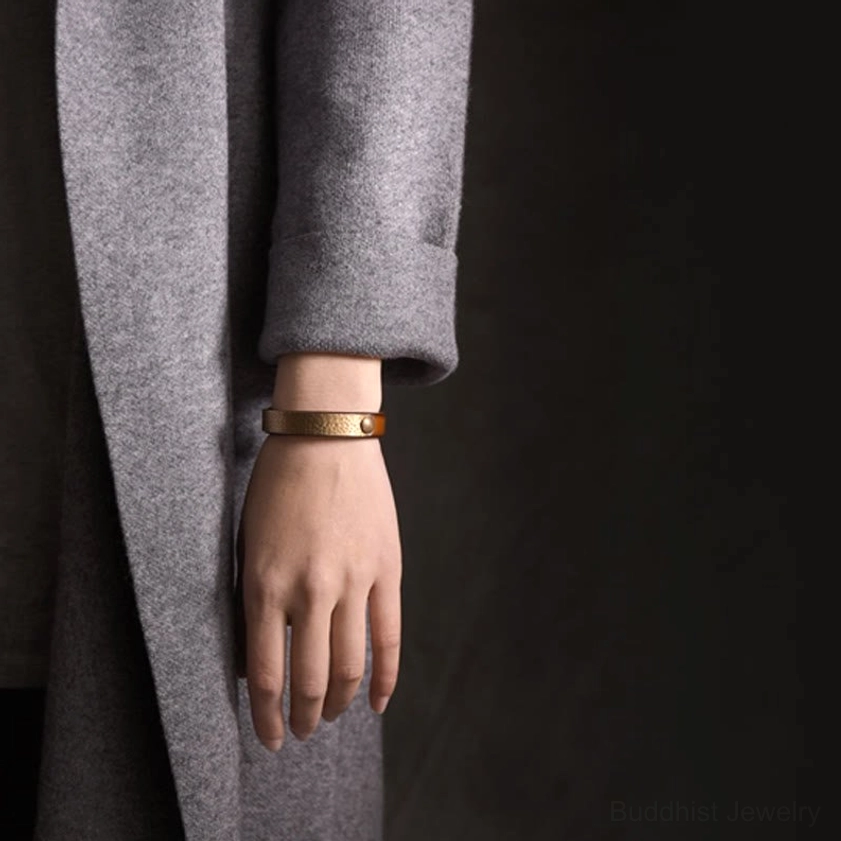 Copper brass leather bangle for wealth and prosperity featuring artisan handcrafted construction