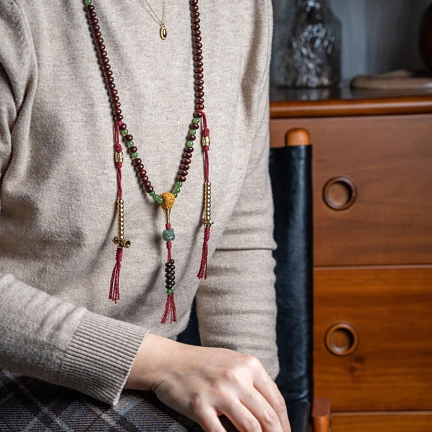 Purple bodhi seeds from Buddhist mala bracelet displayed individually showing natural texture