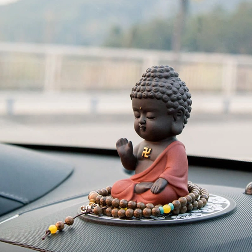 Handcrafted purple clay Buddha statue for meditation and mindfulness practice, small size suitable for altar or desk placement