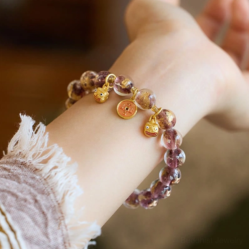 Purple gradient liuli glass bead feng shui wealth bracelet with gold pixiu and coin charms stacked display