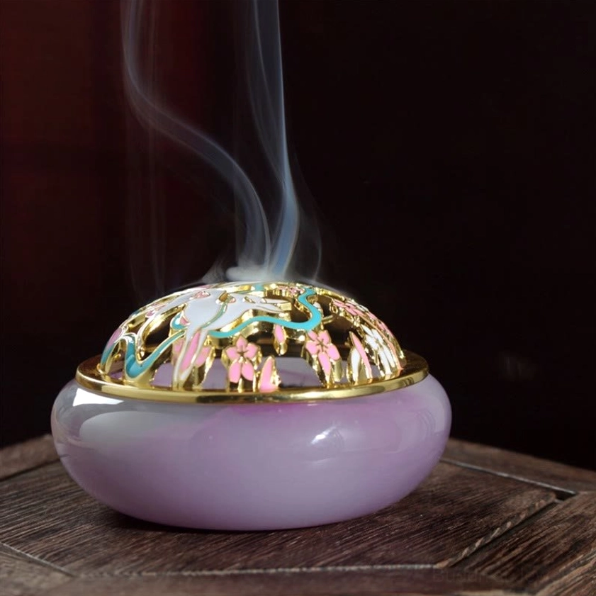 Purple lavender nine-tailed fox liuli crystal incense burner close-up front view with intricate cloisonne carved lid, gold border, and rising aromatic smoke