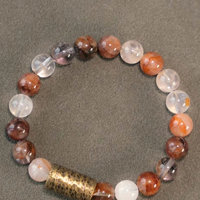 Purple phantom quartz bracelet with natural purple inclusions for love and wisdom energy