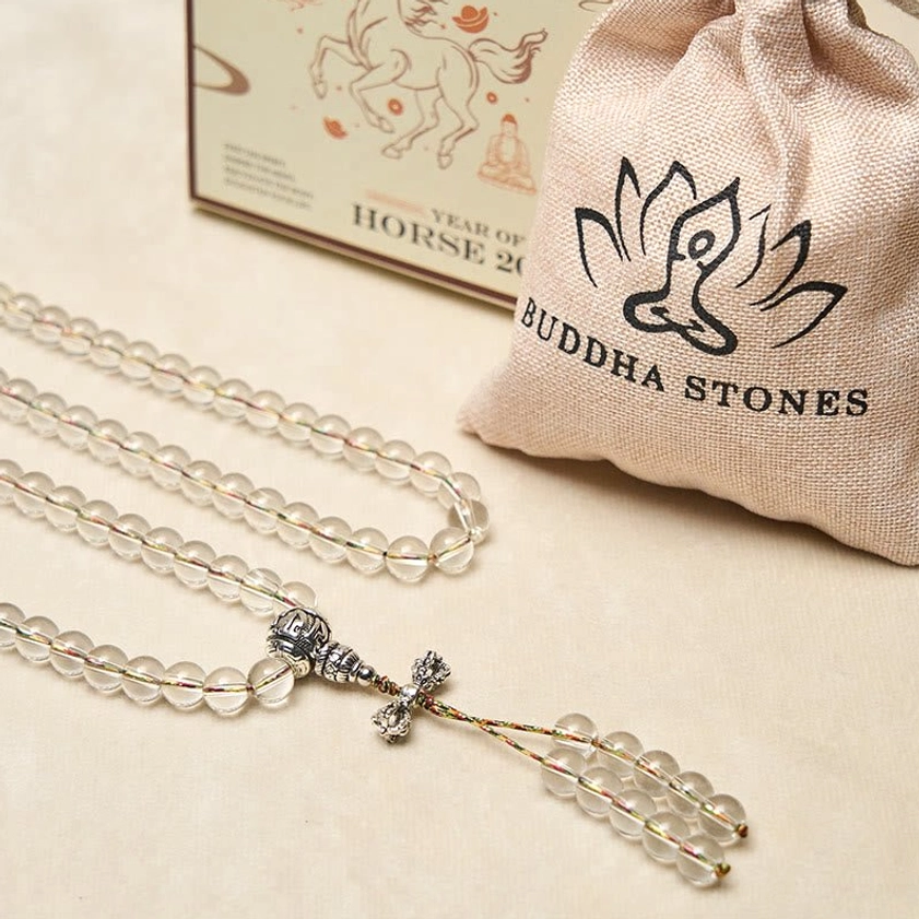 Complete quartz mala meditation beads gift set - flat lay showing coiled clear beads, branded linen dust bag, and premium gift packaging box