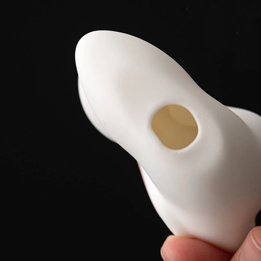 Ceramic rabbit incense holder in natural light showing color accuracy and detail