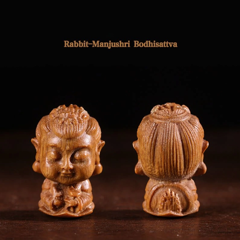 Rabbit's patron Manjushri Bodhisattva Buddha green sandalwood carving with rounded hairstyle and lotus base engravings