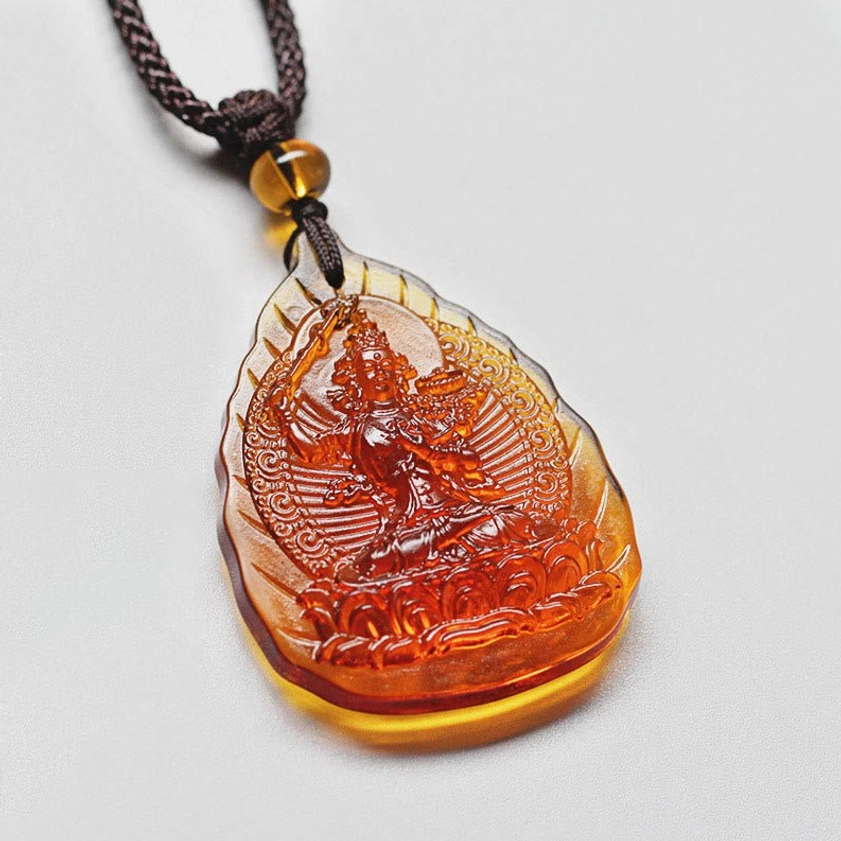 Rabbit Manjushri Bodhisattva Liuli crystal zodiac natal Buddha leaf pendant with wisdom sword relief carving