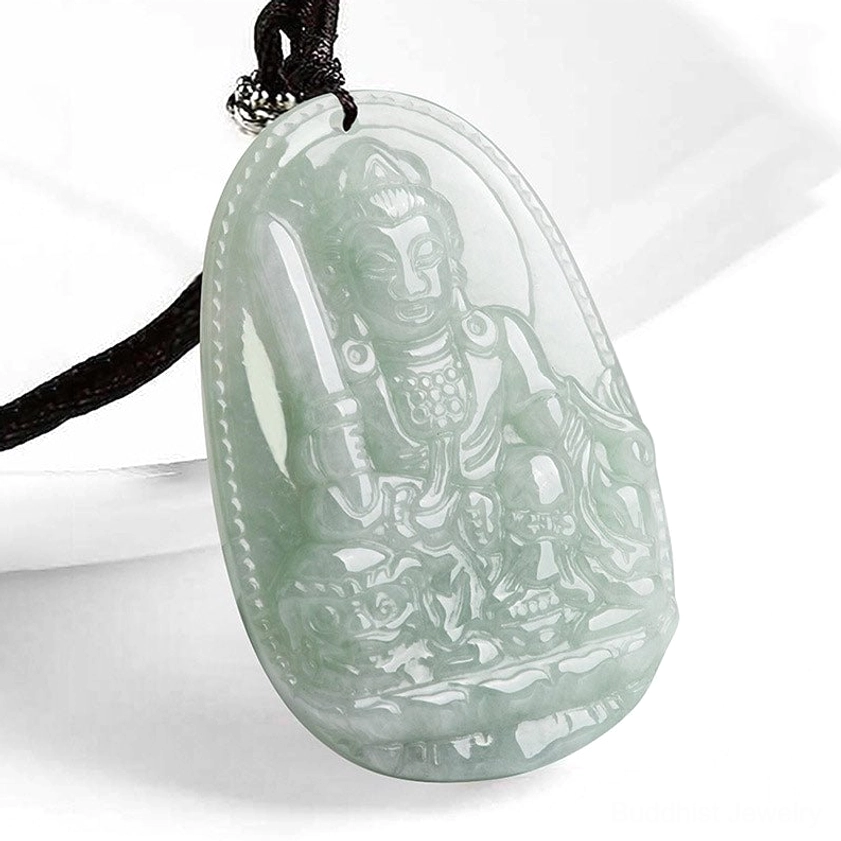 Rabbit zodiac Buddha jade pendant with intricate Bodhisattva carving on white background
