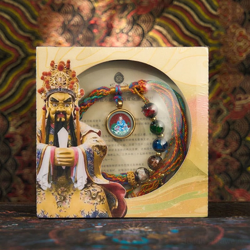 Rabbit zodiac Manjushri Bodhisattva natal Buddha bracelet showing hand-dyed silk braid, glass beads, and wisdom-enhancing spiritual guardian pendant