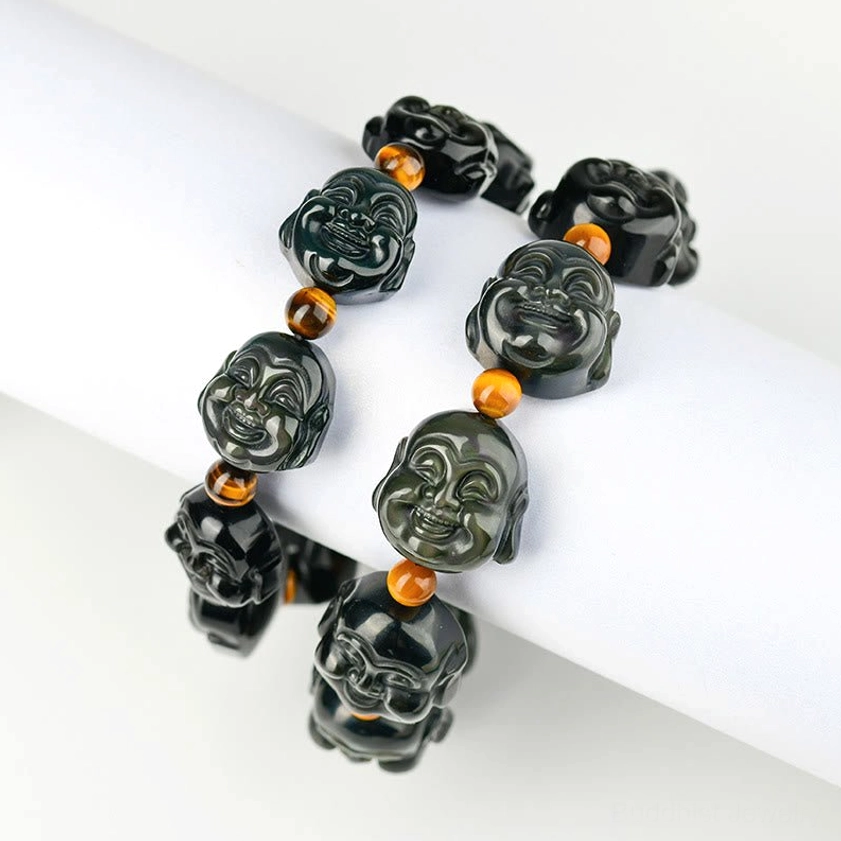Premium elastic rainbow obsidian bracelet detail shot, showcasing hand-carved Buddha bead craftsmanship and stone quality