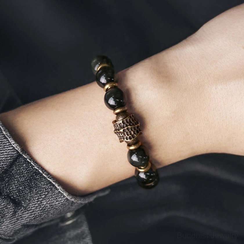 Rainbow obsidian copper healing bracelet featuring natural black iridescent beads and brass accents for emotional wellness and chakra balancing
