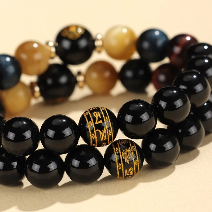 Rat zodiac natal Buddha variant with Thousand-armed Avalokitesvara of black onyx tiger eye bracelet