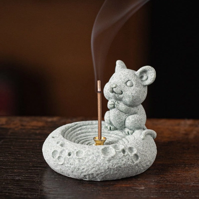 Rat zodiac incense burner three-quarter view burning incense stick lit