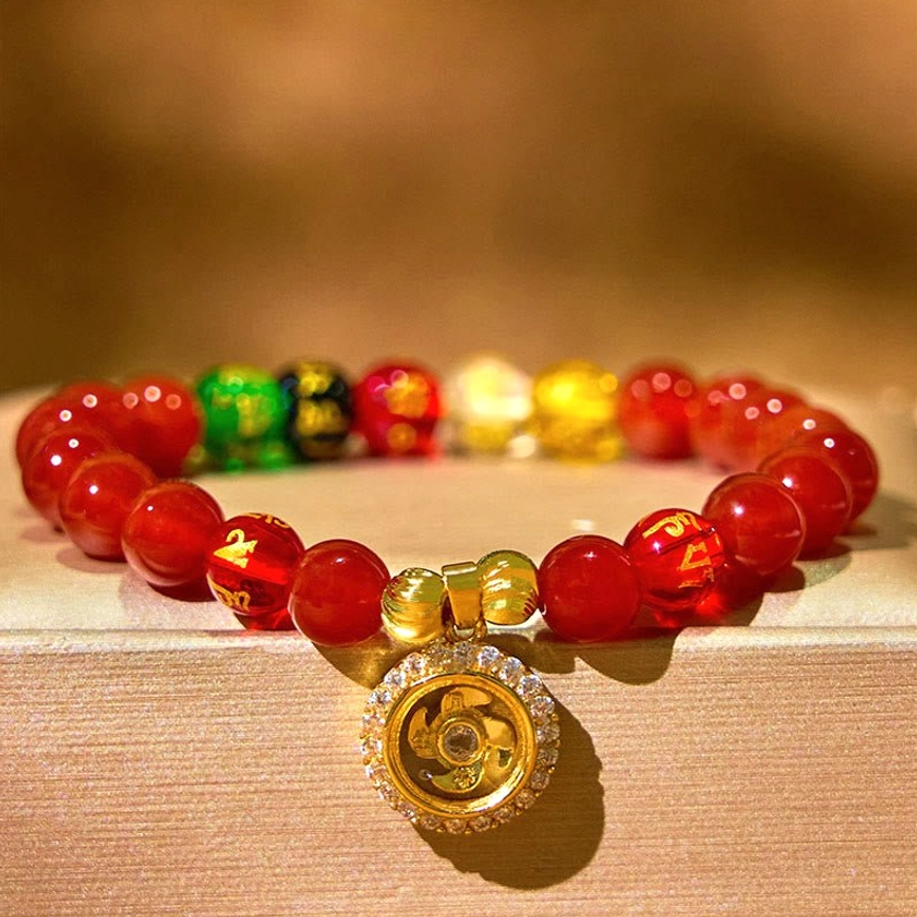 Red agate prayer bracelet with openwork 18K gold-plated cyclone pendant and colorful accent beads