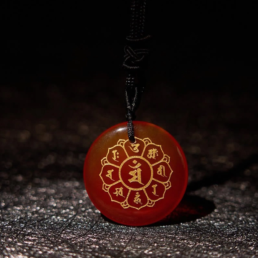 Red Agate Buddhist necklace pendant featuring Om Mani Padme Hum Sanskrit mantra with gold engraving