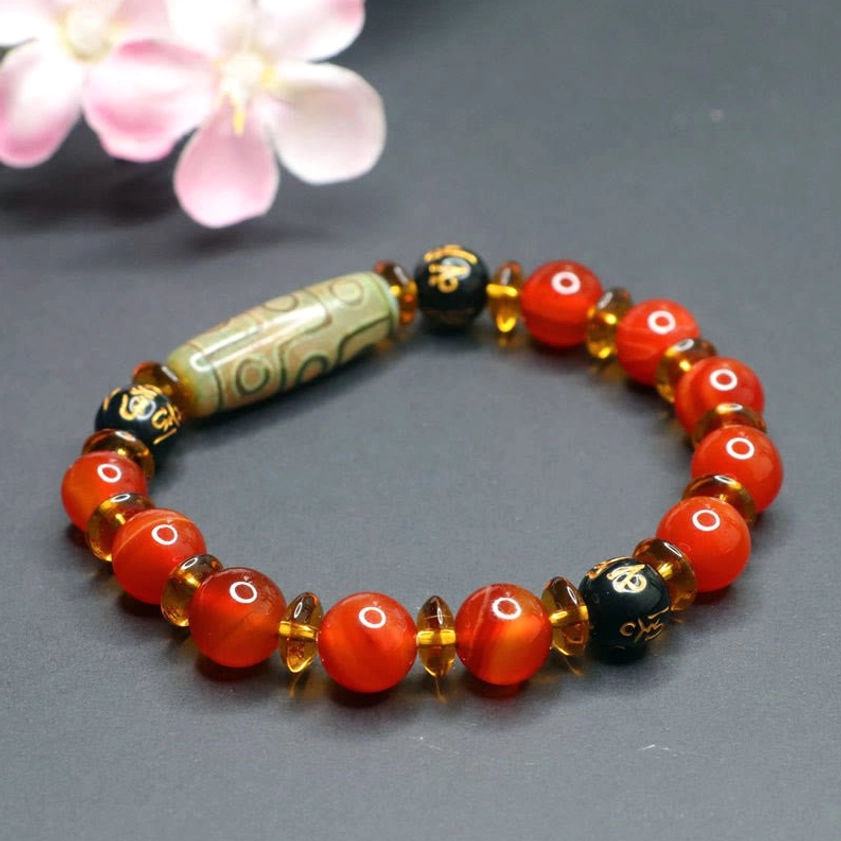 Premium red agate nine-eye dzi bead bracelet with elastic string - wearable spiritual jewelry