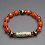 Red agate nine-eye dzi bead bracelet with om mani padme hum mantra beads - top view showcase