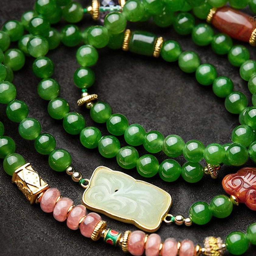 Red agate barrel beads and jade components of 108 bead prayer mala