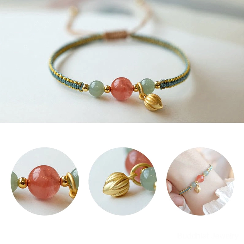 Red agate lotus string bracelet flat lay view with multicolor beads and gold charm