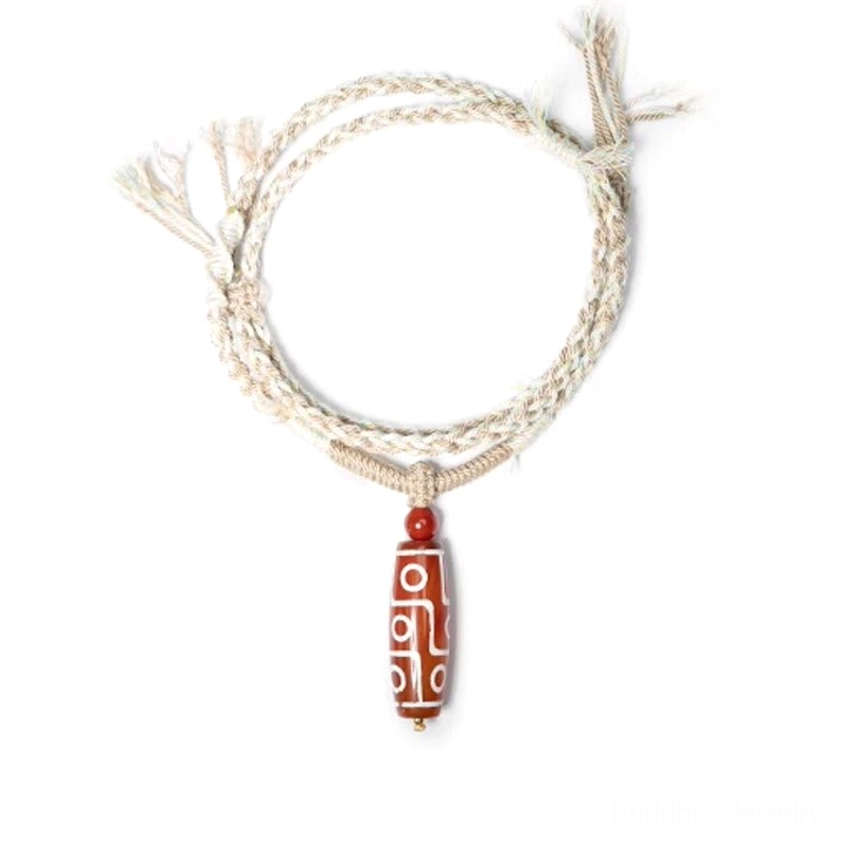 Red agate nine-eye dzi bead buddhist bracelet handcrafted spiritual jewelry for protection and prosperity manifestation