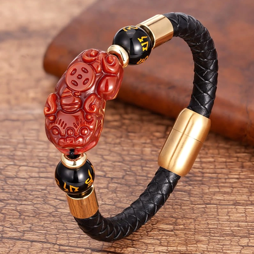 Red Agate stone bracelet detail - natural gemstone showing red agate beads with carved PiXiu charm