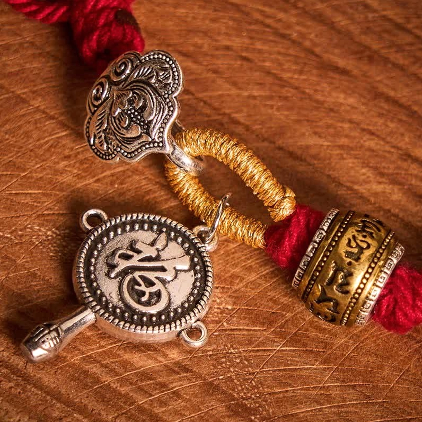 Red Buddhist Braided Bracelet Swastika Symbol Detail View
