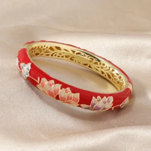 Red cloisonné enamel lotus bangle bracelet with gold-trimmed hollow inner frame, handcrafted Buddhist enlightenment bracelet