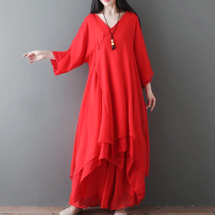 Red Zen meditation tunic close-up detail showing V-neck design and premium breathable fabric quality