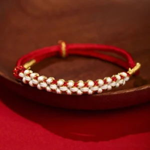 Red Buddhist peach blossom knot bracelet with gold thread, handwoven adjustable string bracelet for protection and prosperity