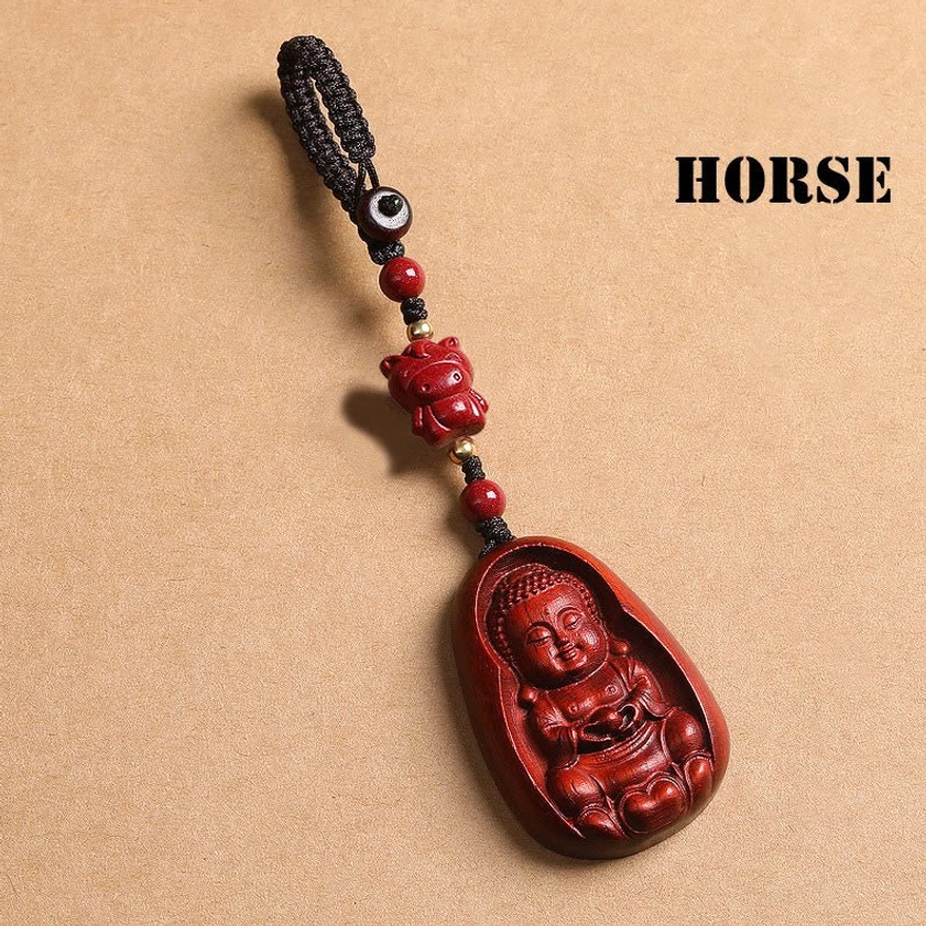 Red sandalwood Horse zodiac Buddha keychain featuring carved animal bead and Buddha charm