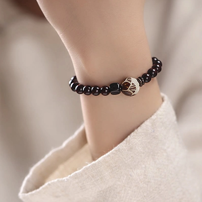 Red sandalwood lotus bodhi bracelet full product display with packaging, showing double and single wrap style variations and authentic craftsmanship