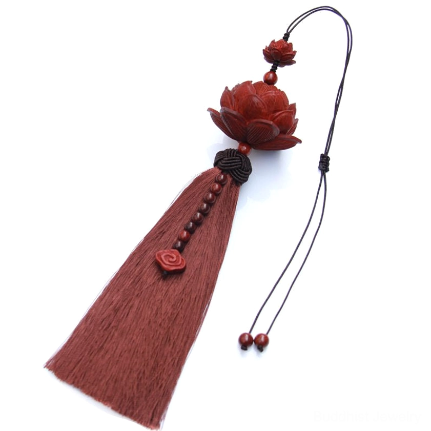 Red sandalwood lotus tassel with intricate carving detail showing authentic Buddhist craftsmanship