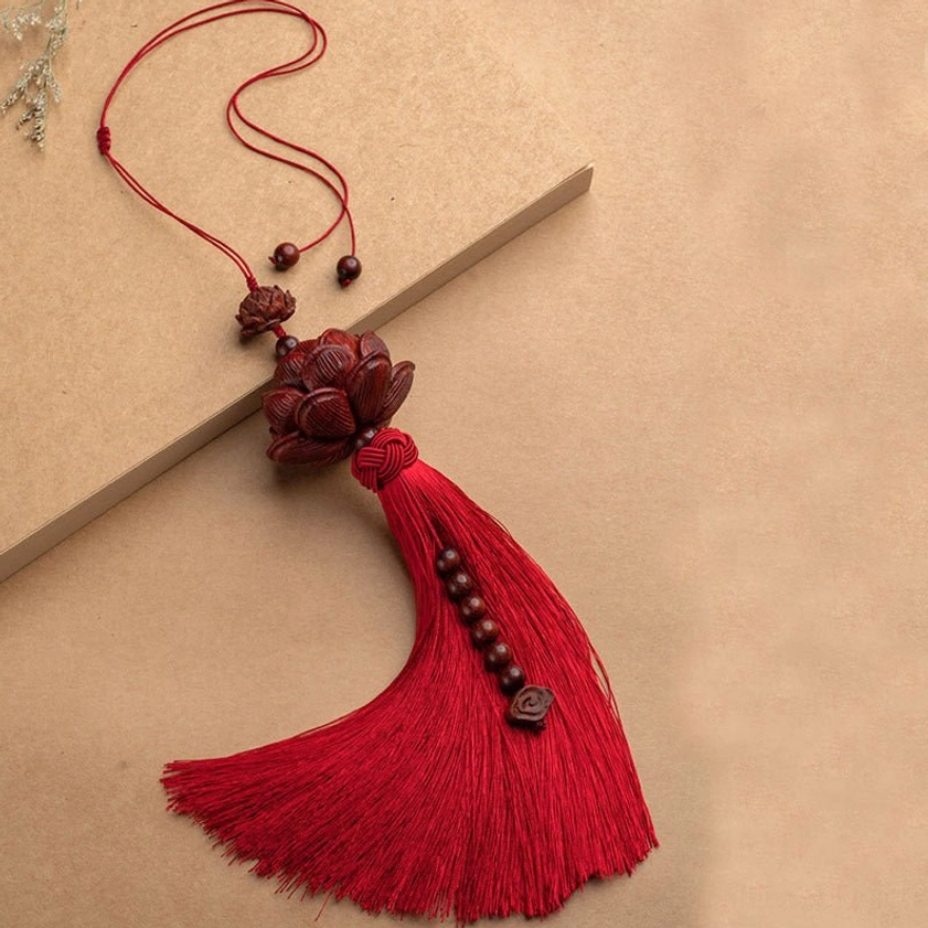 Red sandalwood lotus tassel decoration with cloud-shaped wooden pendant and beaded accents