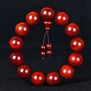 Red sandalwood mala bracelet with single strand design and decorative tassel, handmade Buddhist prayer beads