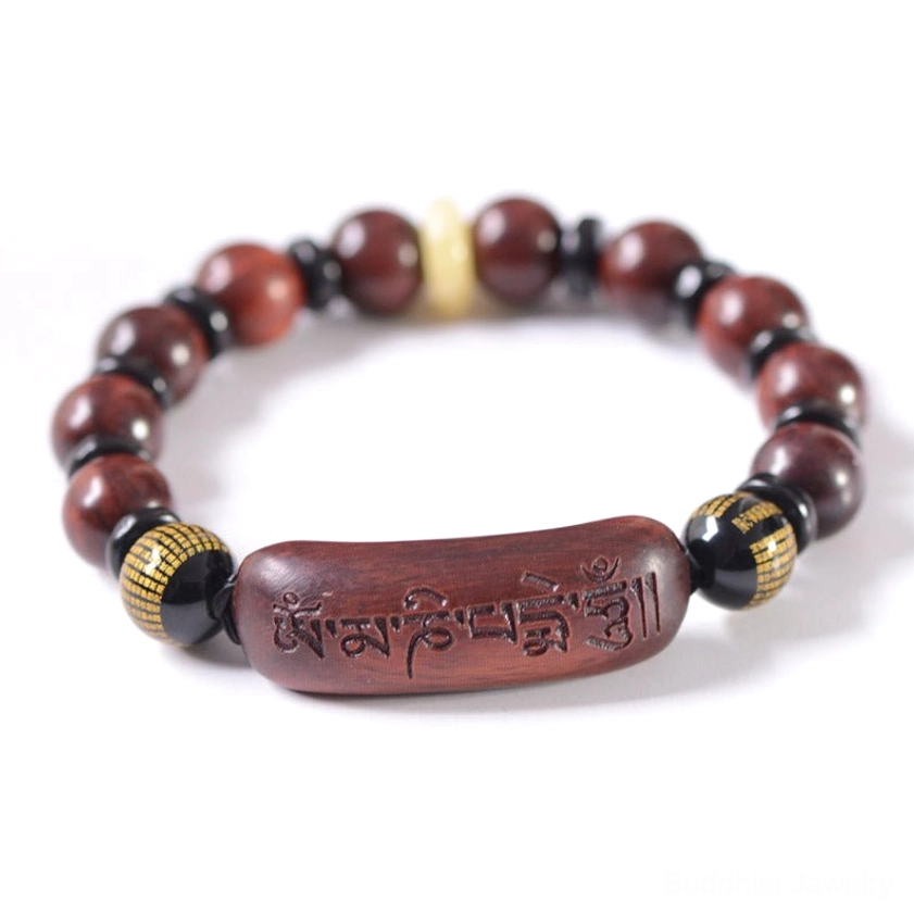 Om Mani Padme Hum engraved sandalwood bracelet showing all beads and mantra detail