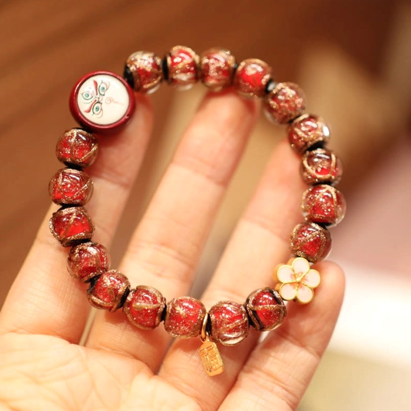 Red and White God of Wealth Buddhist bracelet with prosperity charm pendants mixed colored beads