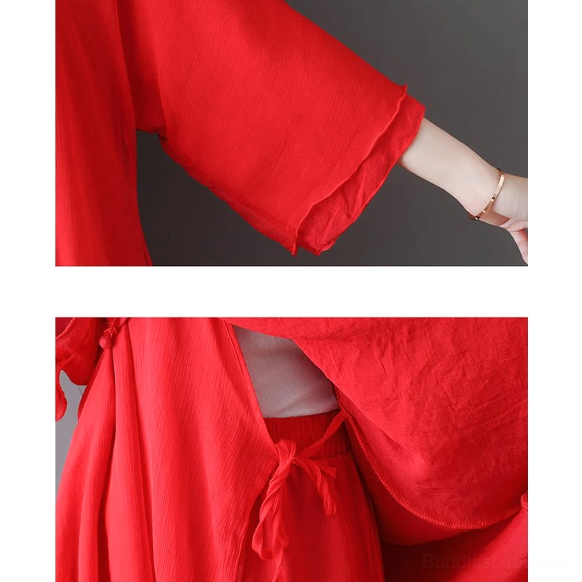 Red Zen meditation dress V-neck detail close-up showing premium polyester blend fabric and skin-friendly material