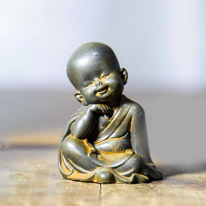 Smiling Monk Resting Chin Statue - Cast Iron Powder Resin Seated Meditation Figurine