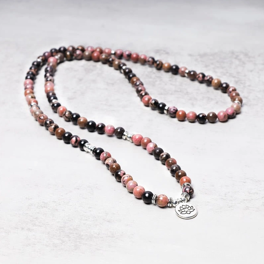 Full-Length Rhodonite Mala Necklace with Silver Lotus Terminal Charm - Flat Lay